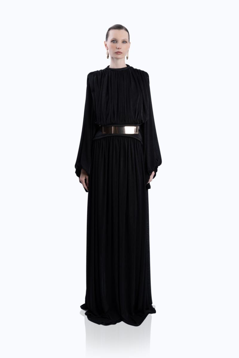 Black Sahara gown by LEDIEL featuring elegant fabric and a flowing silhouette, perfect for formal occasions.