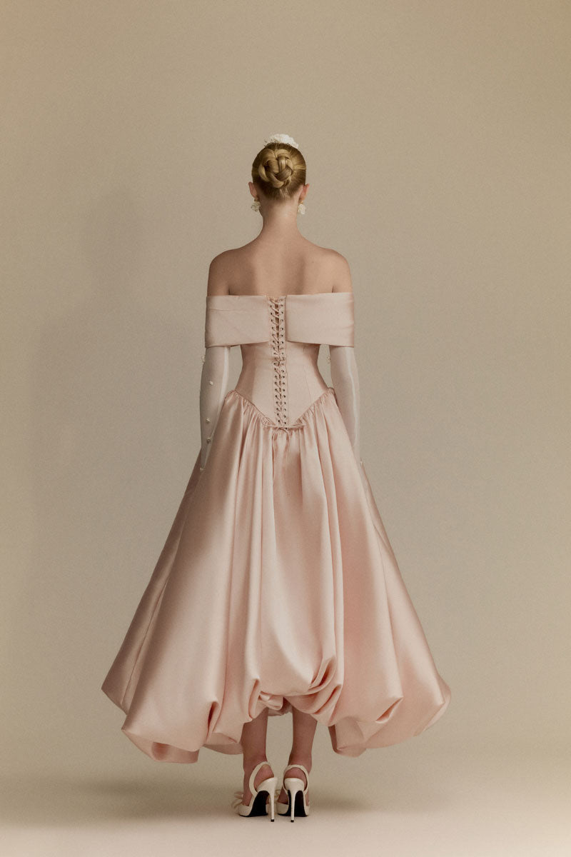White Plan Veronica gown with elegant design, flowing fabric, and detailed bodice, perfect for formal occasions.