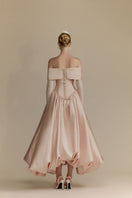 White Plan Veronica gown with elegant design, flowing fabric, and detailed bodice, perfect for formal occasions.