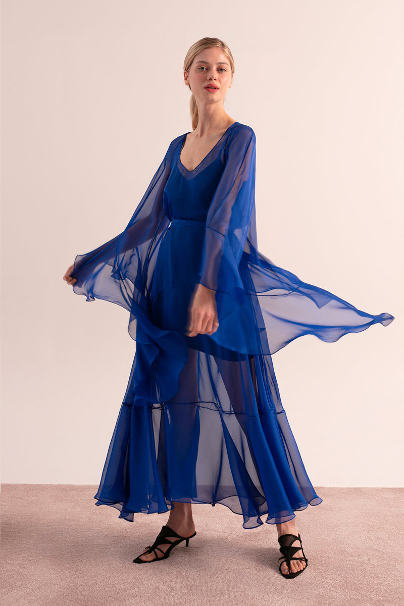 OvertheSea blue maxi dress displayed on a hanger, featuring a flowing design and vibrant color suitable for casual or formal wear.