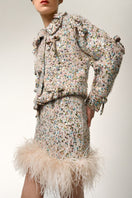 Lalo feather-trimmed mini skirt with bows in multi-color, stylish and playful design, shown with feather accents and bow details.