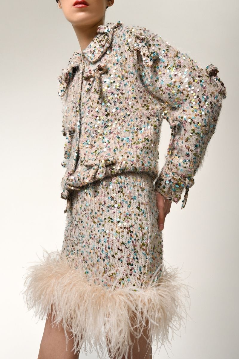 Lalo feather-trimmed mini skirt with bows in multi-color, stylish and playful design, shown with feather accents and bow details.