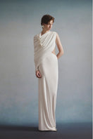 White Plan ELOWEN draped gown with flowing fabric and elegant design, displayed on a mannequin.