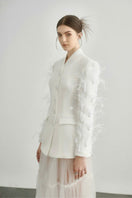 White Jane blazer by Arti Apparel, tailored fit with lapels, shown on a model, perfect for professional or casual wear.