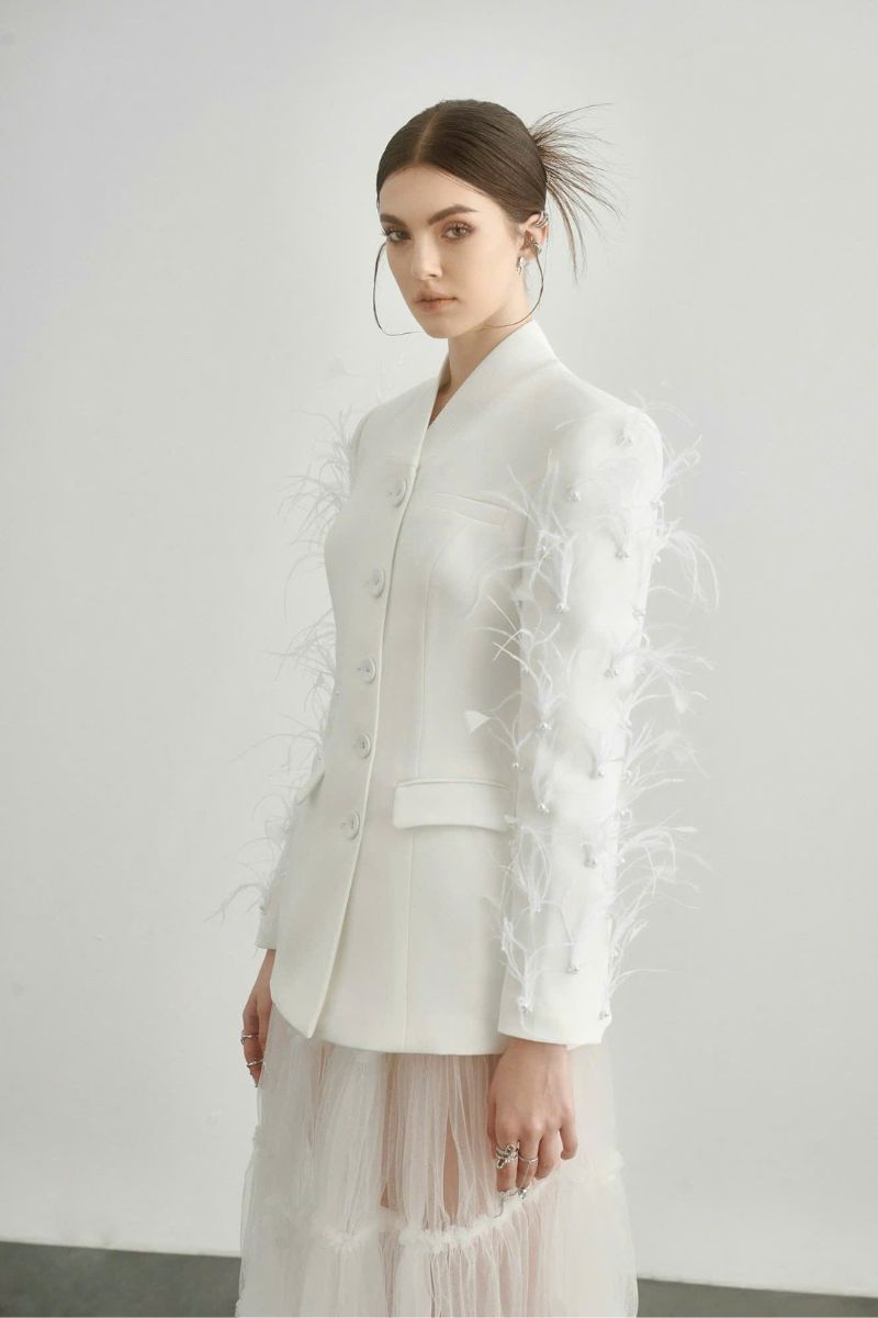 White Jane blazer by Arti Apparel, tailored fit with lapels, shown on a model, perfect for professional or casual wear.