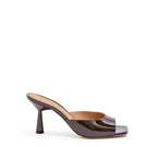 Kolane Greta mule sandals in chocolate brown leather, featuring a stylish slip-on design with a comfortable flat sole.