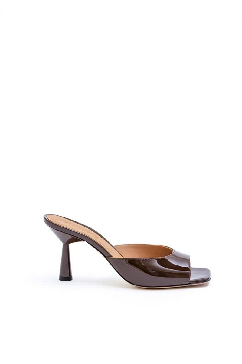 Kolane Greta mule sandals in chocolate brown leather, featuring a stylish slip-on design with a comfortable flat sole.