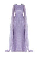 Nur Karaata LA MAMOUNIA purple gown featuring flowing fabric and elegant design, shown on a model.