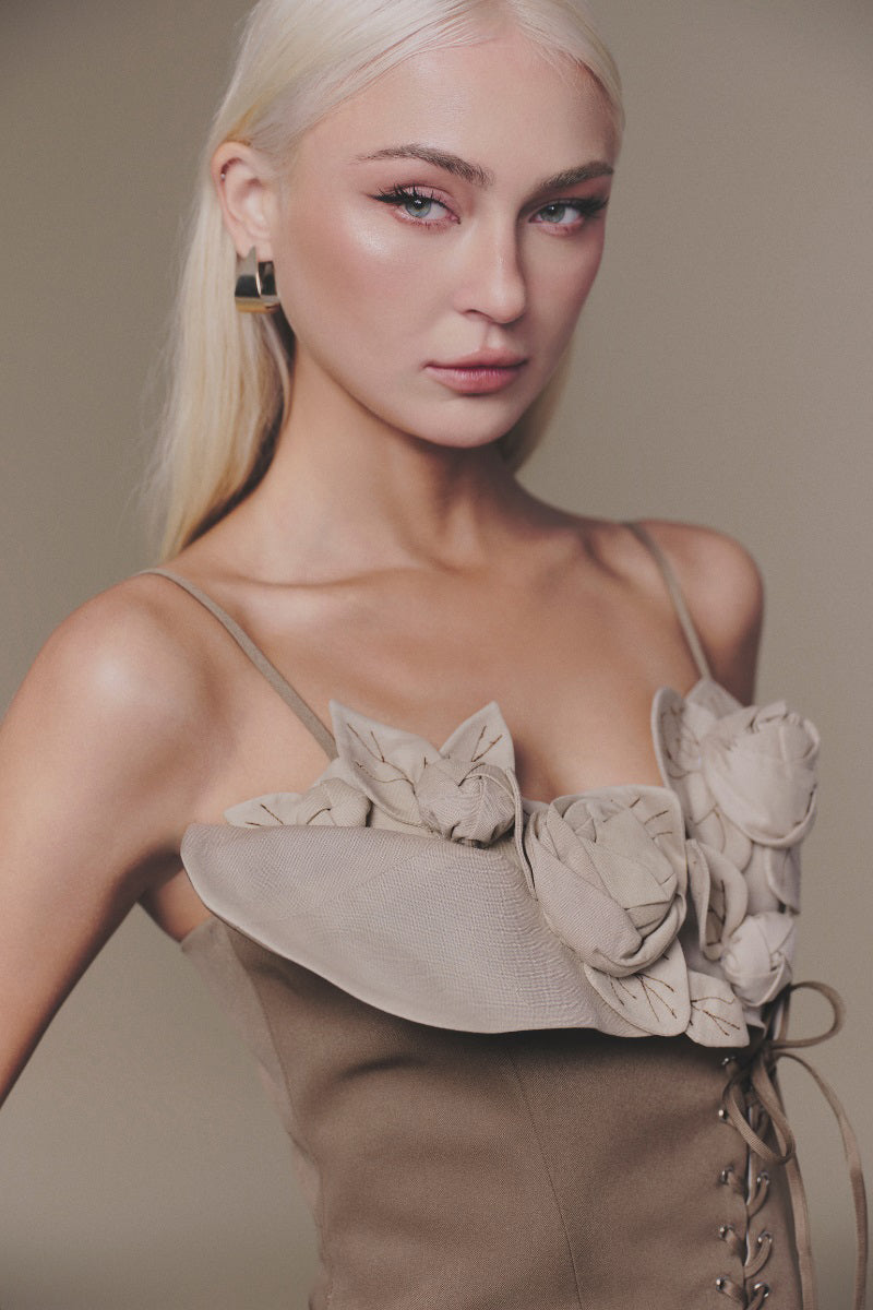 Brown Petal Bustier Top by Keira Tong featuring a fitted design with petal detail, sleeveless style, and structured bust.