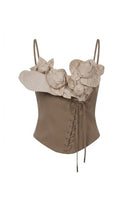 Brown petal bustier top by Keira Tong, featuring floral petal details and a fitted sleeveless design perfect for stylish outfits.