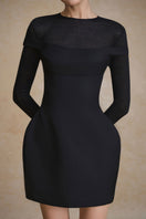 Arti Apparel Prism Dress, a stylish mini dress in vibrant colors, displayed on a hanger against a neutral background.