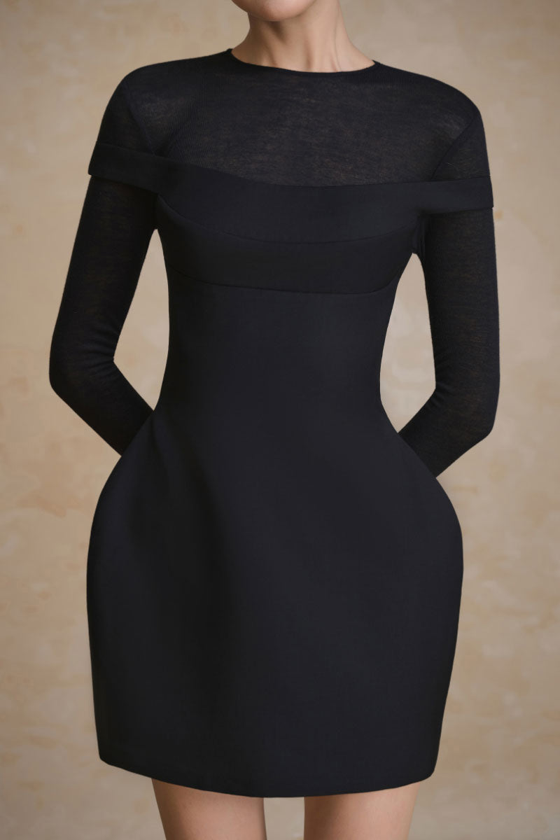 Arti Apparel Prism Dress, a stylish mini dress in vibrant colors, displayed on a hanger against a neutral background.