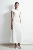 White Squeeze Maxi Dress by TONYY, flowing fabric, sleeveless design, and elegant silhouette, perfect for summer or special occasions.