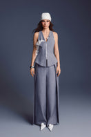 Keira Tong bouquet sleeveless vest showing a stylish, fitted design with floral pattern and vibrant colors.
