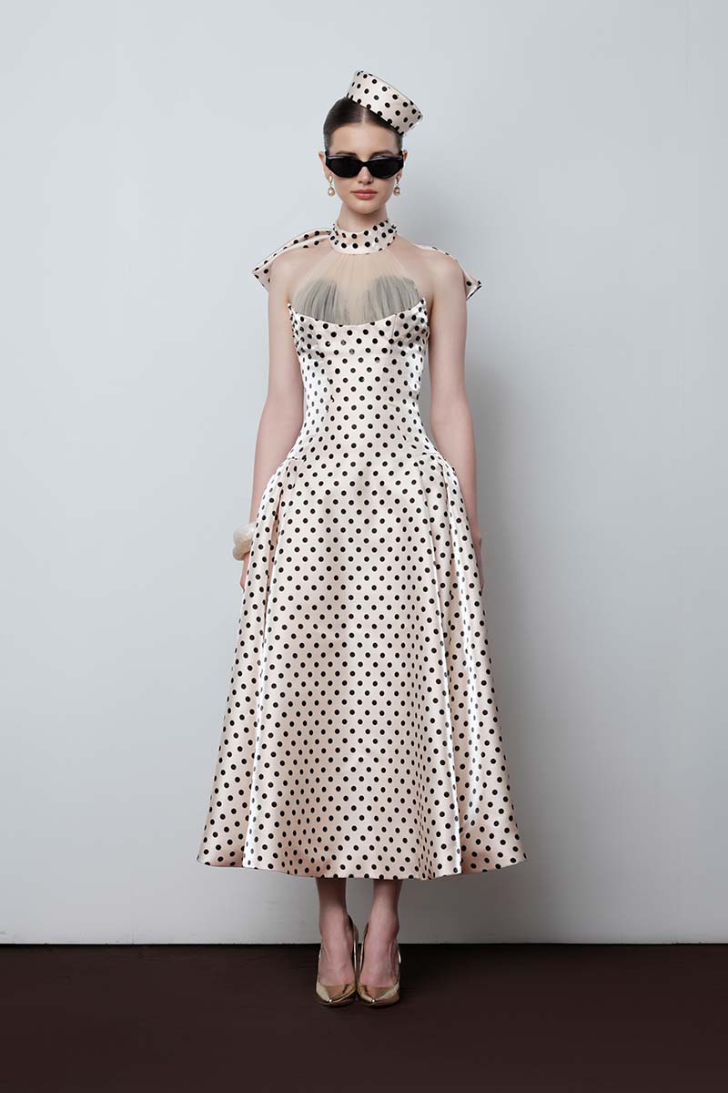 Do Long Timeless Loop Gown featuring elegant fabric and a flowing silhouette for sophisticated evening wear.