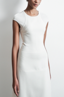 White Squeeze Maxi Dress by TONYY, flowing sleeveless maxi dress with a fitted waist, perfect for elegant summer occasions.