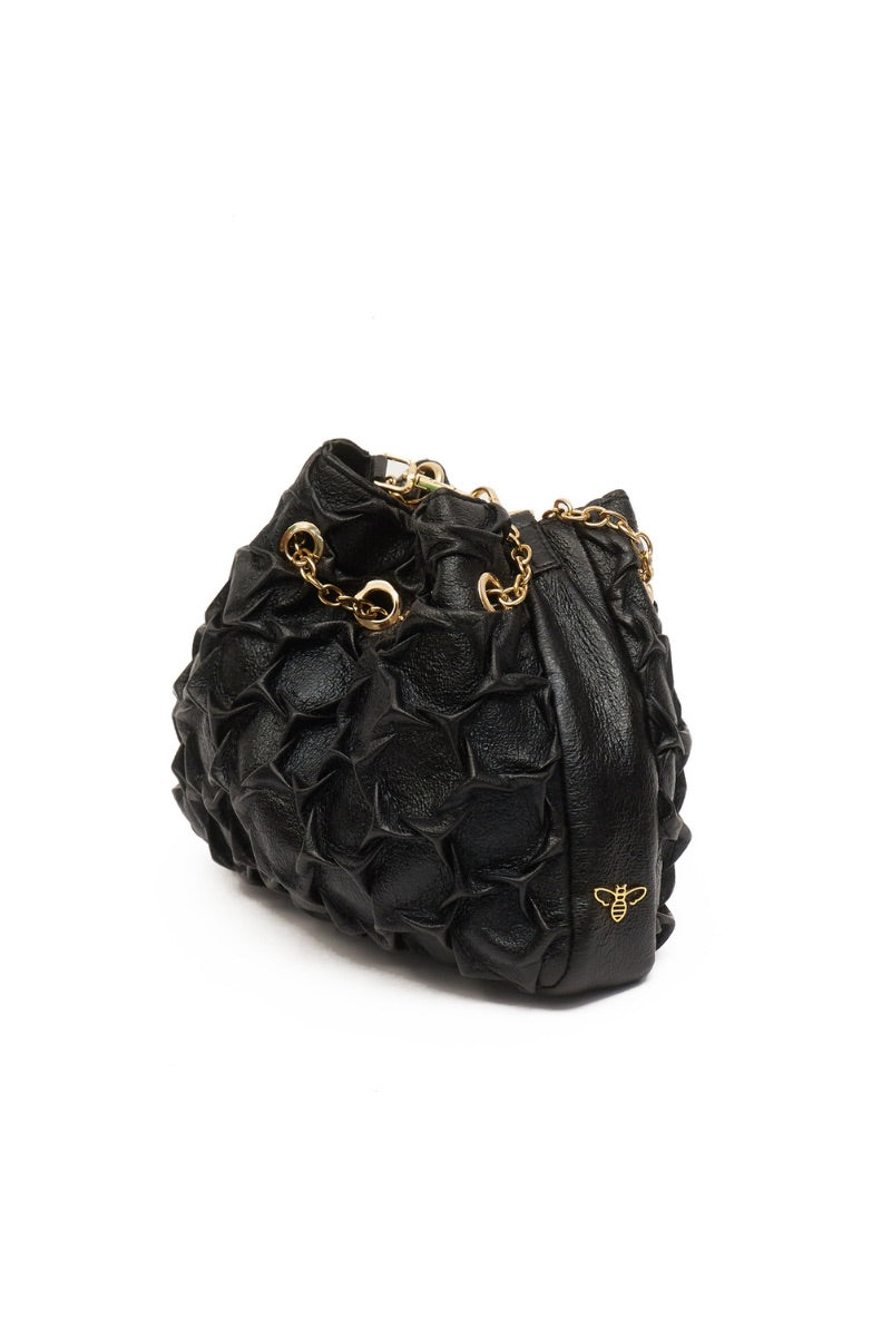 Small black Onalaja HEXAGON shoulder bag with a geometric hexagon shape and sleek design, perfect for stylish everyday wear.
