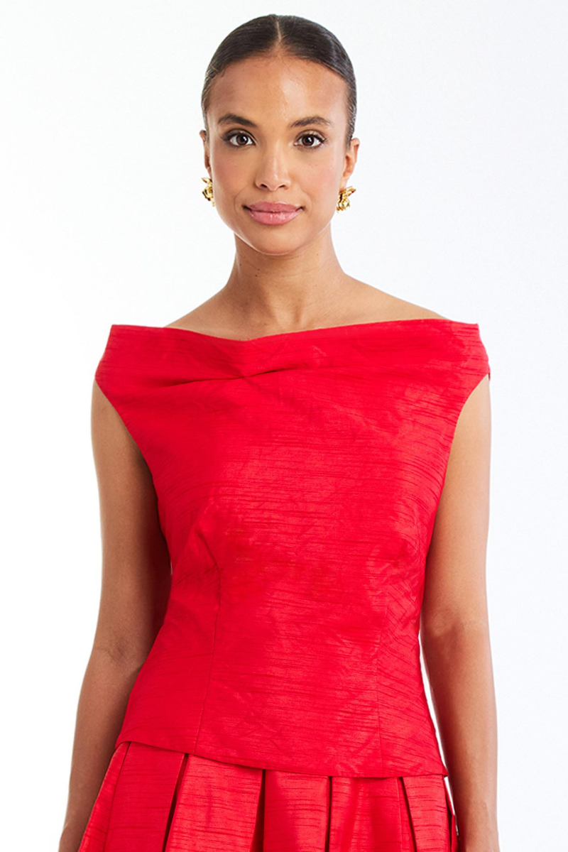Red draped top from Mestiza New York with flowing fabric and stylish design, perfect for casual or dressy occasions.