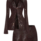 CEM metallic co-ords set featuring a fitted top and matching skirt with shiny, reflective metallic fabric.
