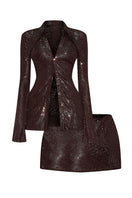 CEM metallic co-ords set featuring a fitted top and matching skirt with shiny, reflective metallic fabric.
