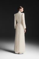 Maison Des Copains ivory cream notch lapel trench coat with classic double-breasted design and belted waist.