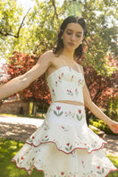 Estefania ivory tulip corset top with fitted design and floral detailing, perfect for stylish occasions.