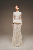 Ethereal lace peplum gown by Margée Atelier featuring intricate lace details and a flowing, elegant silhouette.