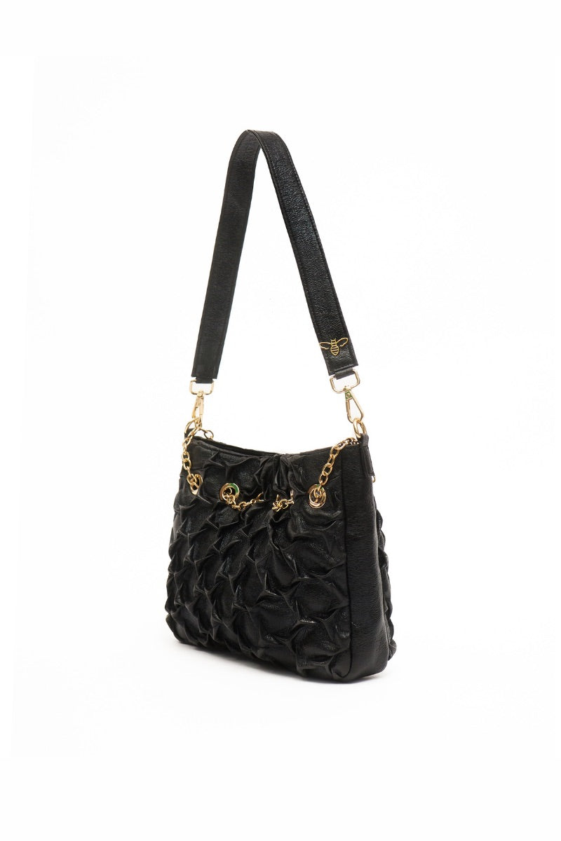 Small black HEXAGON BAG shoulder bag by Onalaja featuring a geometric hexagon shape and sleek design.