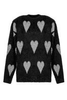 Lalo Valentines silver heart sweater featuring a cozy knit design with a silver heart pattern on the front.