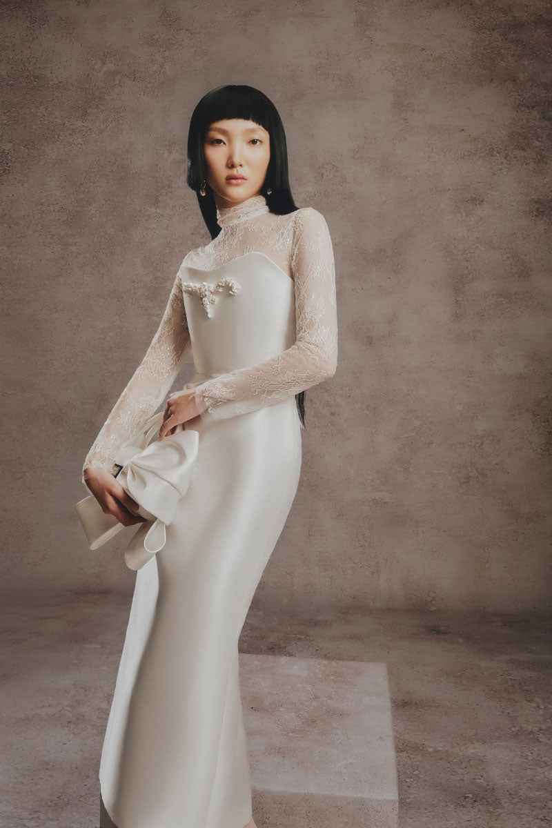 Ivory lace Grace Dress by White Plan, a midi dress with intricate lace detailing and a flattering fit, displayed on a hanger.