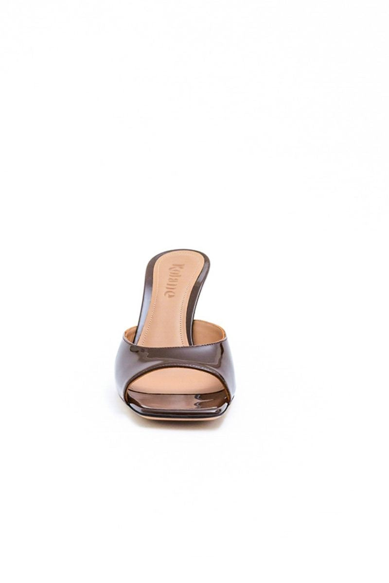 Kolane Greta mule sandals in chocolate brown with open toe and slip-on design, perfect for casual summer wear.