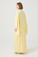 Heidi long rayon robe by Bocan Couture with butter yellow lace, featuring flowing fabric and delicate lace details.