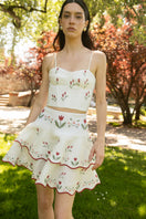 Estefania ivory tulip corset top featuring a fitted design and floral-inspired detailing, perfect for stylish summer wear.
