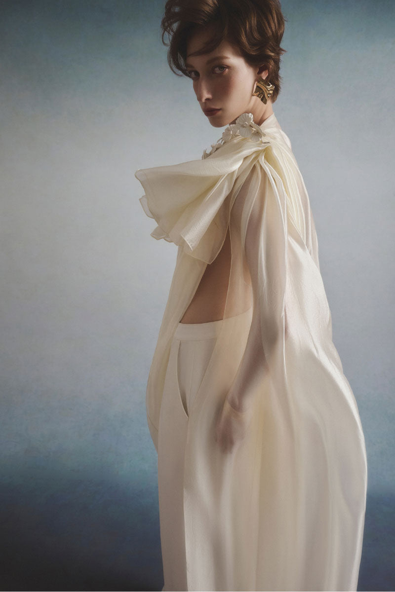 White Plan Eloria Draped Co-ords set featuring a stylish draped top and matching pants on a neutral background.
