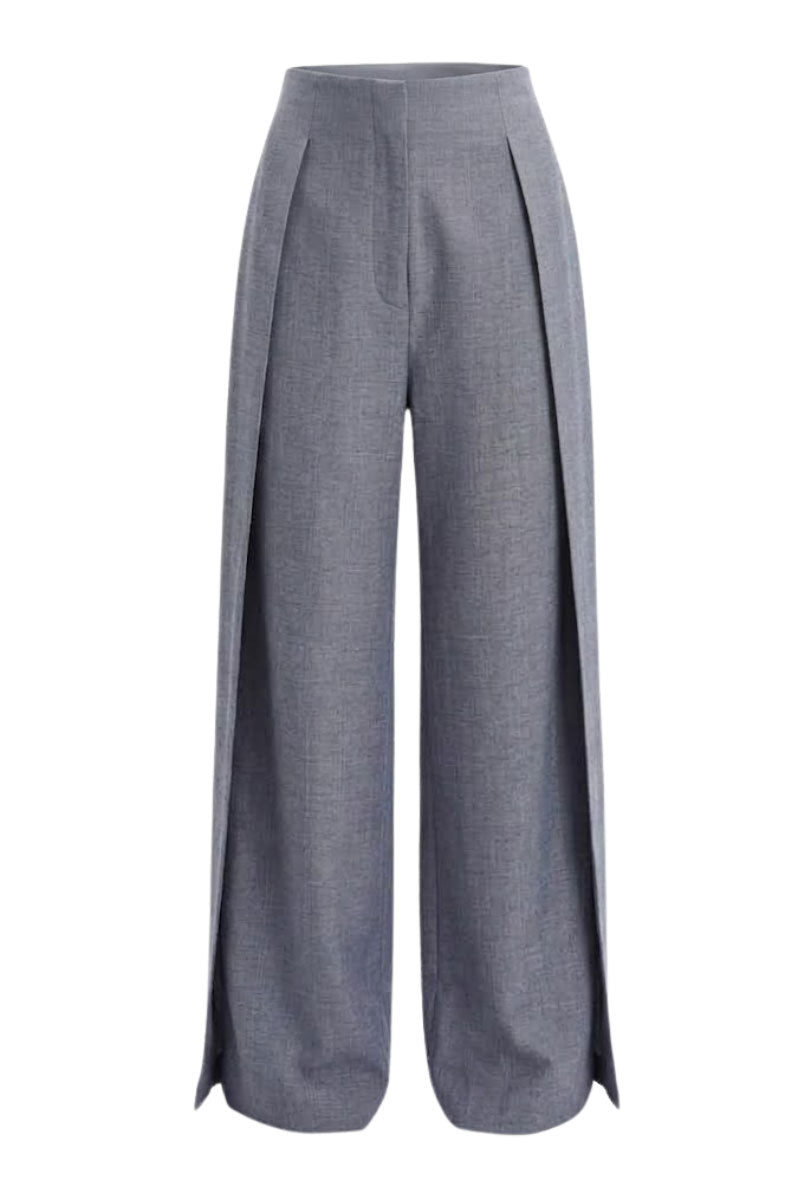 Gray folded layer pants by Keira Tong displayed on a flat surface with detailed fabric texture and layered design.
