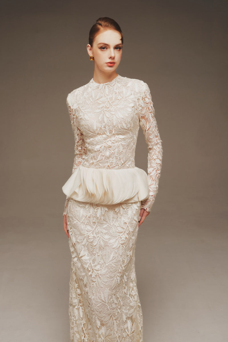 Ethereal lace peplum gown by Margée Atelier featuring a flowing maxi dress with intricate lace details and a fitted waist.