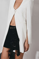 White Pristine Scoop-Neck Blazer by Lecia, tailored fit with lapel collar, long sleeves, and sleek design, displayed on a hanger.