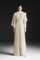 Maison Des Copains ivory cream trench coat with a notch lapel, tailored for a classic, sophisticated look.