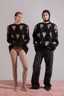 Lalo Valentines silver heart sweater featuring a cozy knit design with silver heart accents, perfect for Valentine's Day.