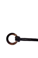 Brown leather belt by Adriana Castro featuring the LE KNOT design, sleek and stylish accessory for various outfits.