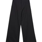 Dāl the Label cotton twill pants in a relaxed fit, showing the waistband and front pockets on a neutral background.