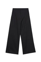 Dāl the Label cotton twill pants in a relaxed fit, showing the waistband and front pockets on a neutral background.