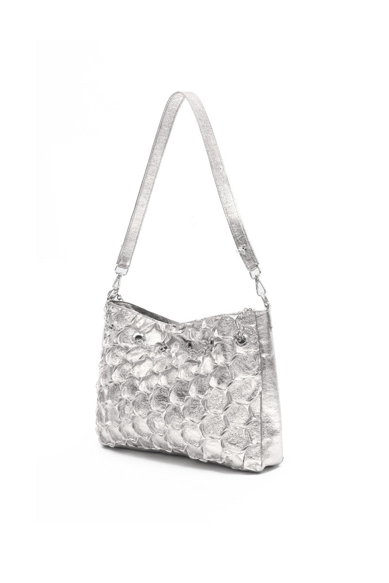Small silver HEXAGON BAG by Onalaja featuring a geometric hexagon shape and a sleek shoulder strap.