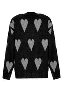 Lalo Valentine's silver heart sweater featuring a cozy knit design and a subtle heart pattern in silver on soft fabric.