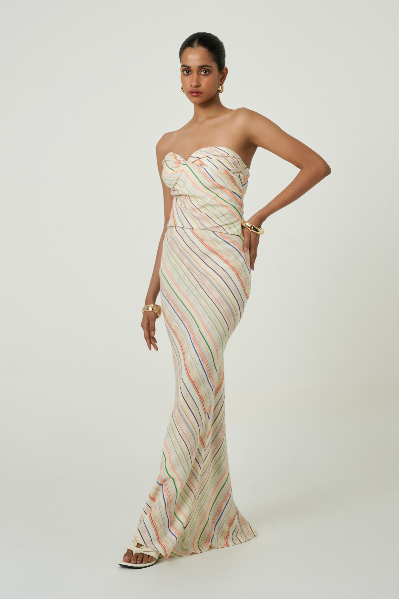 Summer Away Cefalù woven stripe maxi skirt with flowing fabric and vibrant striped pattern for a stylish summer look.