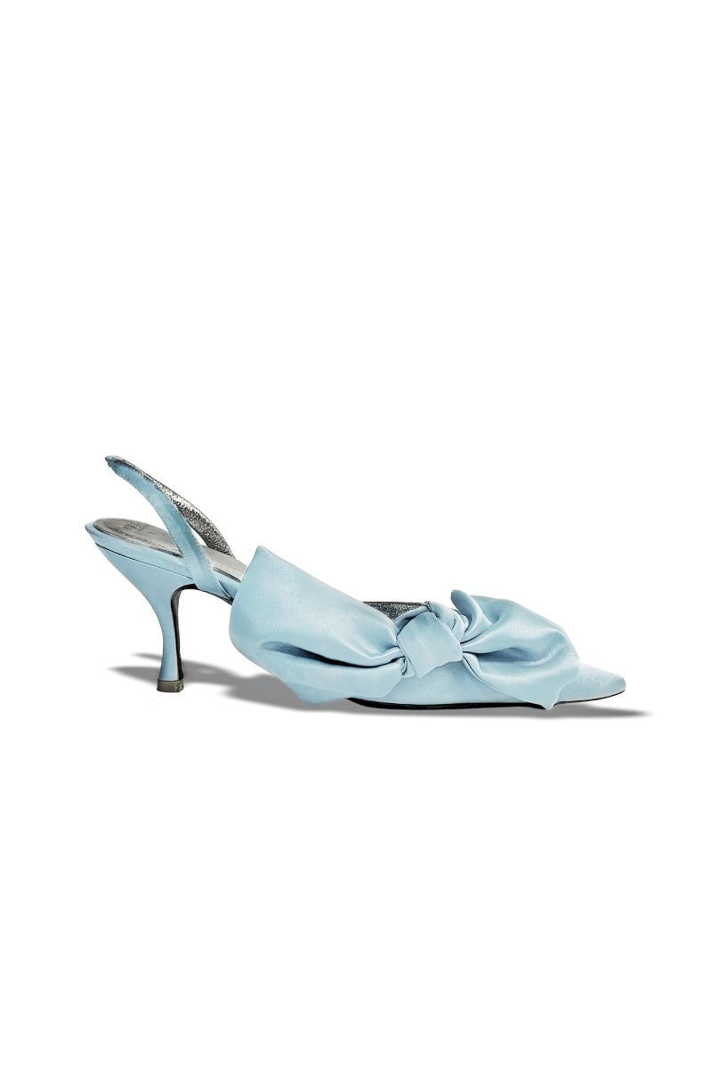 Christin Wu Cinderella Bow Heels showing elegant black heels with decorative bow detail and pointed toes.