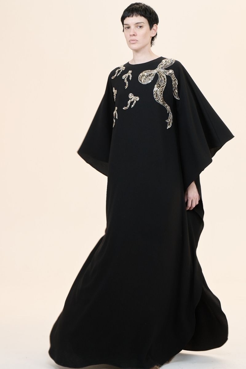 Nihan Peker NEEHAL Batwing Gown in elegant fabric with batwing sleeves and intricate detailing, front view.