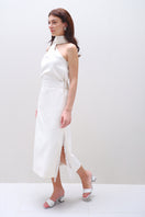 Aidan & Ice Amira midi skirt in cream, shown in a flowing midi length with soft fabric and elegant design.