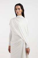 Deme By Gabriella Nadia white draped gown with flowing fabric and elegant design, perfect for formal occasions.