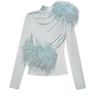 Sky blue high neck top with feather details from Lalo, featuring a stylish and elegant design.